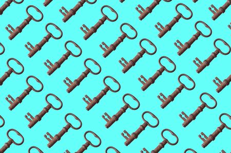  pattern of old rusty keys on a blue background. the key is repeated many times.