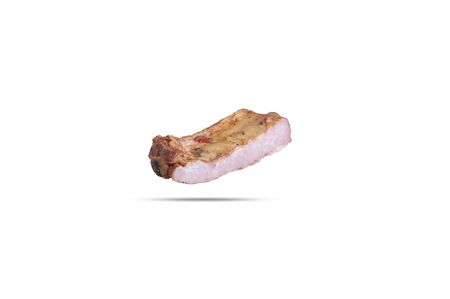 smoked pork ribs in the context of pink juicy meat is visible. isolated on white background.の写真素材