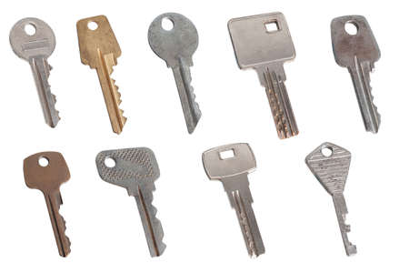 collection of different house keys isolated on white background