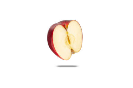 Ripe red apple half fruit isolated on white background. Half of red apple fruit with clipping path