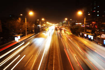 City nights bright lights shuttle trafficの写真素材