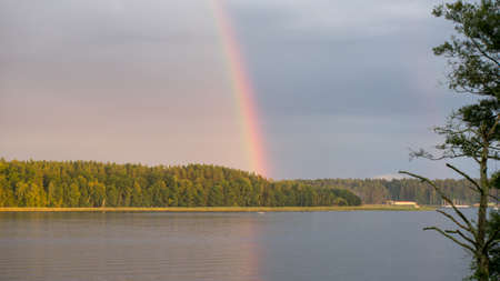 waterfall and reflections on the water lakeの写真素材