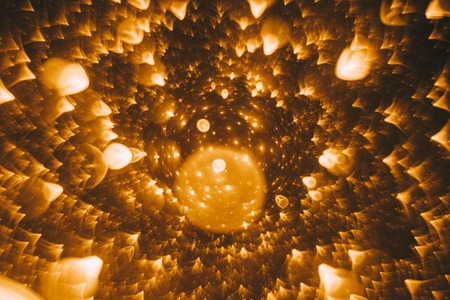 Golden lights in the darkness are photographed by lens of Petzvalの写真素材