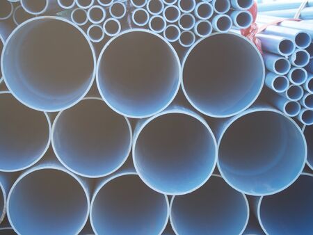 PVC pipes and the background of the evening sun on the farm.