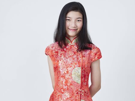 Portrait of asian woman in traditional chinese dress isolated on white background. Chinese new year.