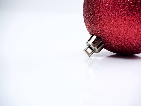 Close up Christmas decoration red ball isolated on a white background. space for textの写真素材