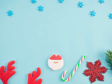 Close-up of christmas decorations against light blue background.の写真素材