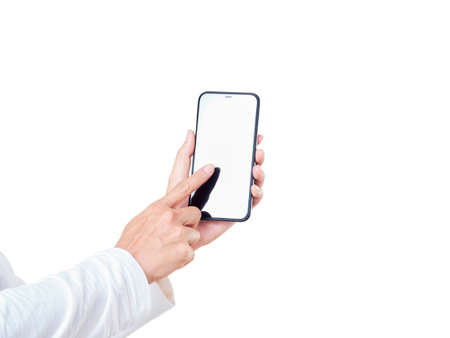 Close up of woman hand touching a smartphone white display isolated on white background