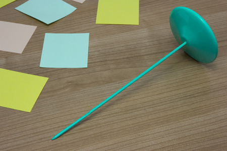 Card holder lie on the wood table with colorful card look like no any orders