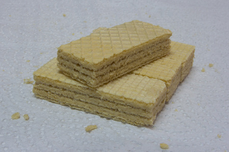 Cream wafer brick on white paperの写真素材