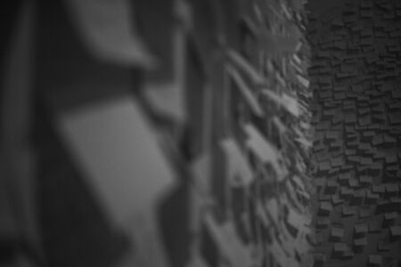 paper stickers with different inscriptions and drawings glued to the wall. paper stickers for notes....