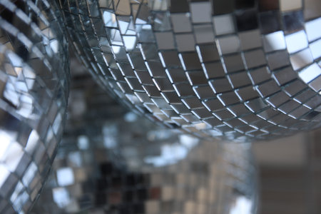 disco balls lying in the basket on top of each other disco balls behind the bars balls from the...