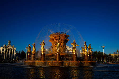 Beautiful colorful fountain "Friendship of peoples" in the park VDNH, Moscow in the evening, beautiful colorful Fountain Friendship of peoplesの写真素材