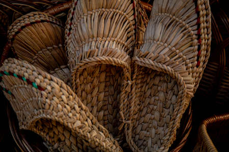 handmade spoons and baskets of their wood. wicker baskets. rustic life wooden spoons natural products. handworkの写真素材