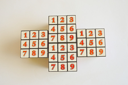 Four rubic cube on the tableの写真素材