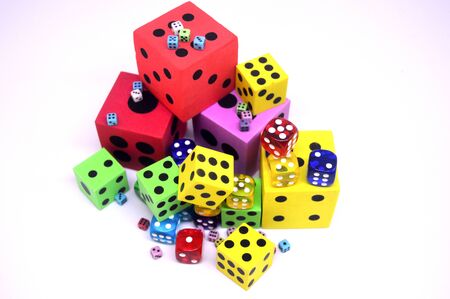 Playing dice at white wooden background.Rolling the dice concept for business risk - risk...