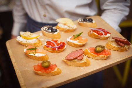 Small snacks pintxos on the treeの写真素材