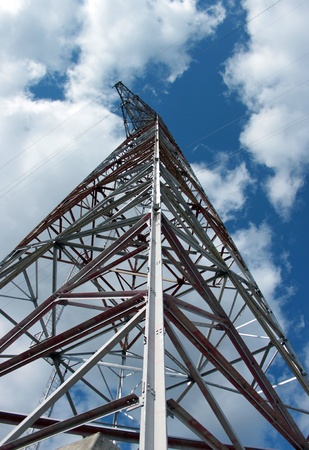 Metal design for a power line against the sky の写真素材