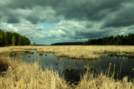 Landscape of clouds in the sky over the river の写真素材
