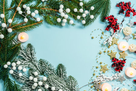 Christmas pattern on a light blue background with colorful decoration ornaments things. Concept of winter, christmas or new year. Flat layの写真素材