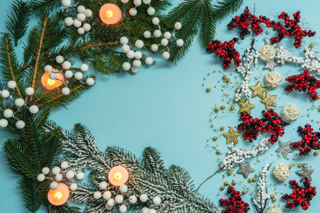 Top view on new year pattern on a light blue background with colorful decoration ornaments things. Concept of winter, christmas or new year. Flat layの写真素材
