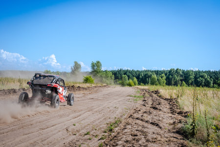 A Cool view on hard ride UTV, ATV, 4x4 in sandy roadの写真素材