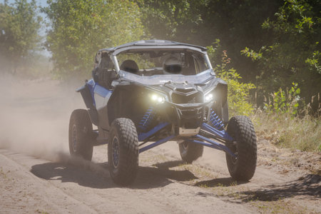 UTV, 4x4 off-road vehicle in the action. An amateur competitionsの写真素材