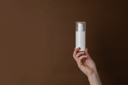White cosmetic cream bottle with a pump. Natural moisturizing, nourishing cosmetics for skin, beauty and spaの写真素材