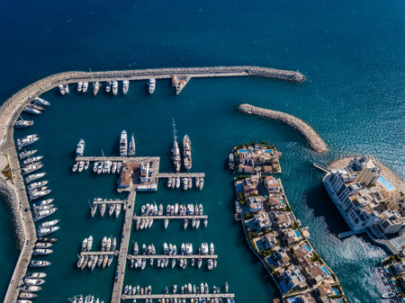 Aerial shot of marina port with amazing yachts and sailboatsの写真素材