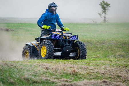 ATV, UTV, buggy, 4x4 off-road vehicle in the mud and dust. Extreme, adrenalinの写真素材