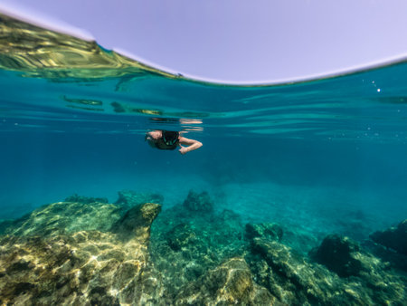 Underwater photo of woman snorkelingの写真素材