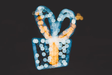 Golden and white bokeh of christmas gift box  backgroundの写真素材