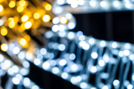 Romantic glitter vintage lights with black background. Defocusedの写真素材