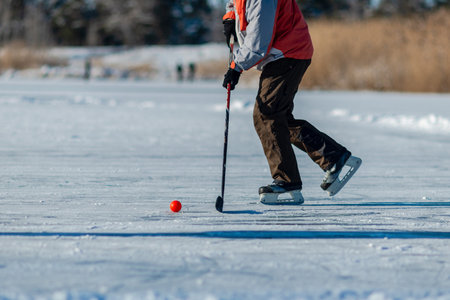 Playing ice street hockey on the frozen lake