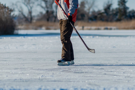 Playing ice street hockey on the frozen lake