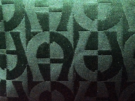 Etienne Aigner pattern on cosmetic bagの素材