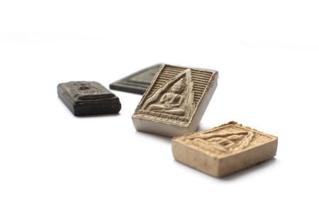 square Buddha Amulet on whiteの写真素材