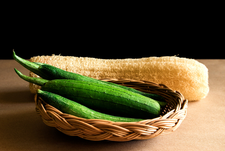 Luffa cylindrica (L.) M.J.Roem and Trichosanthes anguia Linn. Green fresh in basket weave with dry...