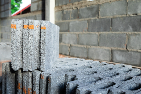 Close up view and copy space. New concrete block under construction house.の写真素材
