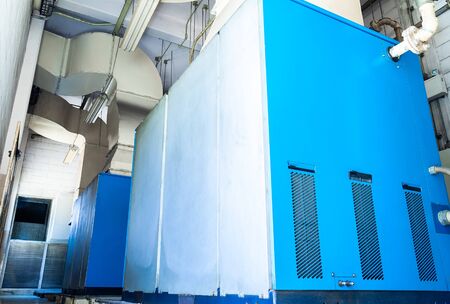 Low light view inside of factory. Low view of the old Machine control room for on - off the large air pumps.の写真素材