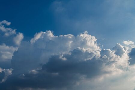 Sunlight pass through hit the clouds is cause light streak beautiful and blue sky.