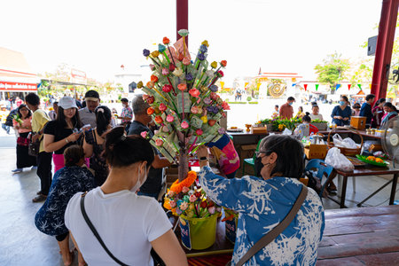 Wat Lahan Rai, Rayong, Thailand-February 24.2024. People come to make merit and ask for blessing from the monk statue. It is very popular and respected by the Buddhist people.のeditorial素材