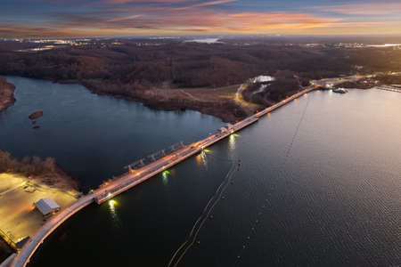 Dam in Lake Ozark, Missouri during sunsetの写真素材