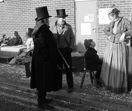 Victorians dressed for a day out at a fair in portsmouth dockyard,1st december 2012のeditorial素材