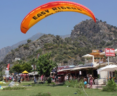 Paragliding at oludeniz beach, Turkey.The take off from the mountains from a height of 6500ft,3Oth july 2012のeditorial素材