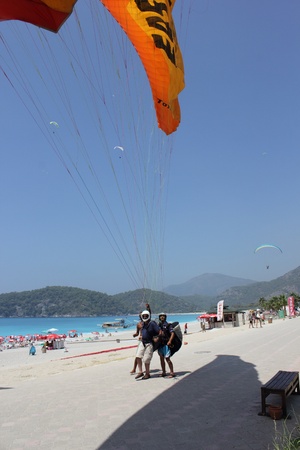 Paragliding at oludeniz beach, Turkey.The take off from the mountains from a height of 6500ft,3Oth july 2012のeditorial素材