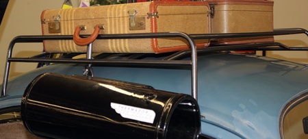 roofrack with suitcases atop an old vintage vw car,april 2013のeditorial素材
