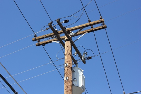 Telegraph poles against a blue sky in the american Boulder city, april 2013
