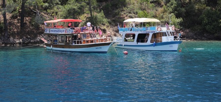 Boat trips around the bays of calis in Turkey with blue skys and deep blue seas, Turkey, calis, 30th May 2013のeditorial素材