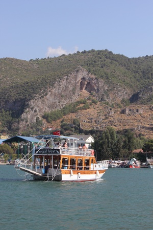 Turkey, Fethiye, 20th July 2013 - A boat returning to the port of Fethiye in turkey after a daytrip around the islands and baysのeditorial素材